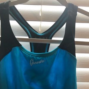 A blue and black one piece bathing suit.